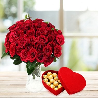 60 Red Roses with Ferrero Heart box delivery to Pakistan